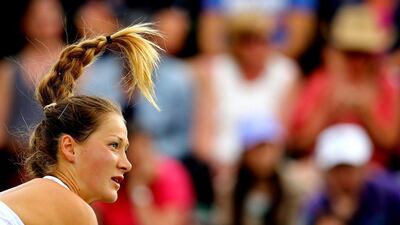 Bojana Jovanovskiof Serbia knocked out Victoria Azarenka on Wednesday at the 2014 Wimbledon Championships. Al Bello / Getty Images / June 25, 2014