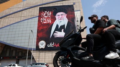 A billboard depicting the late Iranian supreme leader Ayatollah Ali Khamenei in a street in central Tehran. EPA