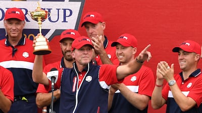 USA captain Steve Stricker celebrates with his team and the Ryder Cup trophy after victory against Europe at Whistling Straits, Wisconsin, in September. PA
