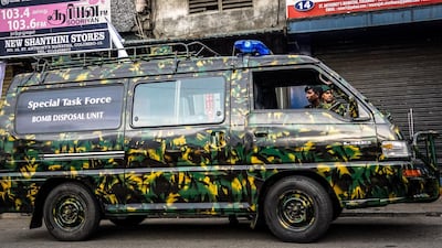A bomb disposal unit van is seen at the site of a controlled explosion in Colombo, Sri Lanka, April 22, 2019. Jack Moore / The National.