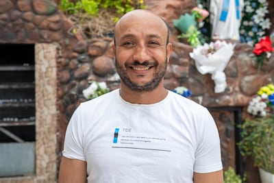 Maher Makram from Egypt attends Easter Sunday mass at St Michael’s Catholic Church in Sharjah. Ali Al Shouk / The National