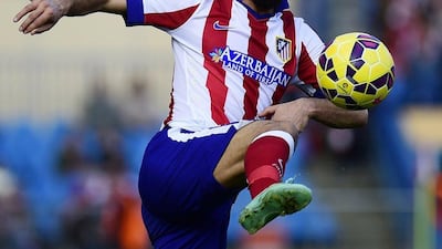 Arda Turan has agreed a move to Barcelona, but will not make his debut until January. Pierre-Philippe Marcou / AFP