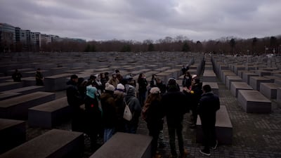 Tourists visit the Holocaust Memorial in Berlin, Germany. AP Photo