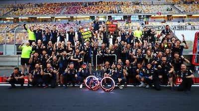 Max Verstappen and Sergio Perez celebrate with Red Bull team team in Shanghai. Getty Images
