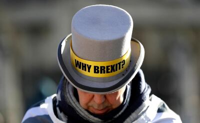 Why Brexit? is the new message on Mr Bray's hat. AP