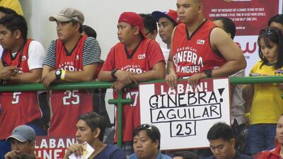 Fans show support for PBA team Barangay Ginebra San Miguel on Friday in their PBA game in Dubai. Jonathan Raymond / The National