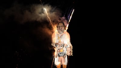 An effigy of film producer Harvey Weinstein is burned during a fireworks display in England. Jack Taylor / Getty Images