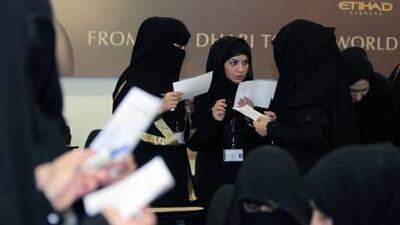 Emirati women from Al Ain gather for an orientation session at the Etihad Airways Training Centre in Abu Dhabi yesterday.