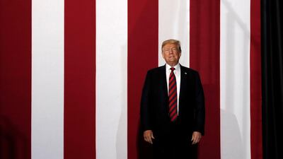 President Donald Trump takes the stage during a campaign rally in Springfield. Reuters
