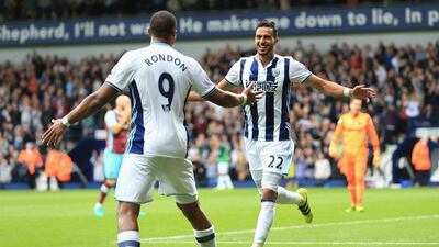 Nacer Chadli of West Brom celebrates scoring his side’s first goal with Salomon Rondon. Stephen Pond / Getty Images