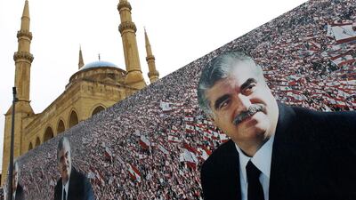 A poster of former prime minister Rafiq Hariri is on display near his tomb for the 10th anniversary of his assassination, in downtown Beirut. Nabil Mounzer / EPA