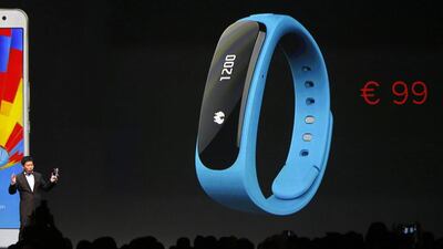 Huawei chief executive Richard Yu talks about the TalkBand B1 during a Huawei presentation at the Mobile World Congress in Barcelona. Gustau Nacarino / Reuters