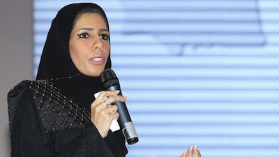 Nada Askar Al Naqbi, head of the executive committee for the Arab Women Sports Tournament, speaks to the press in Sharjah yesterday. Sarah Dea / The National