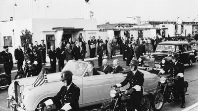 US President Eisenhower and UK Prime Minister Harold Macmillan sitting in the back of a Rolls Royce in London in 1959.