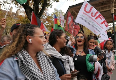 Demonstrators with a Jewish French Union for Peace flag at a rally to support Palestinians and to demand for a ceasefire. AFP