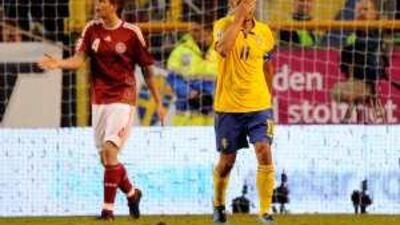 Sweden's captain Henrik Larsson, right, will miss the Malta game. His side are in danger of missing out on the World Cup finals.