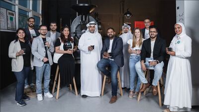 Ali Al Ebrahim, founder and chief executive of the Cofe, centre, with his leadership team. Photo: Cofe