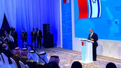 Israeli Prime Minister Naftali Bennett speaks to a group of Bahraini businesspeople during an official visit to Manama. AP