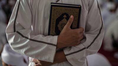 A Malaysian religious student holds the Quran at school during the Muslim holy fasting month of Ramadan in Hulu Langat, near Kuala Lumpur. Mohd Rasfan/AFP Photo
