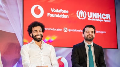 Liverpool and Egypt star Mohamed Salah with his lawyer and agent Ramy Abbas Issa. UNHCR / Vodafone Foundation