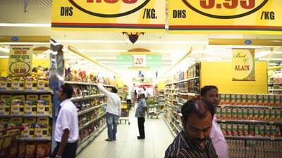 ABU DHABI, UNITED ARAB EMIRATES -- August 10, 2010 -- People shop for groceries and food at a store in Abu Dhabi. Lee Hoagland / The National