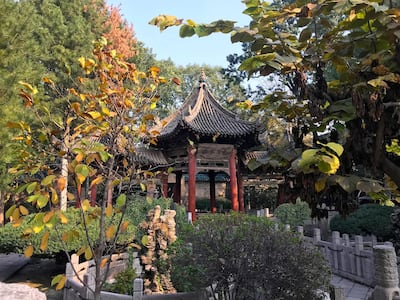 Women's mosques are often associated with a mosque for men. Lee Jing Ping leads prayers at a mosque related to the eighth-century Great Mosque, pictured here, in Xi'an, China. Anna / The National