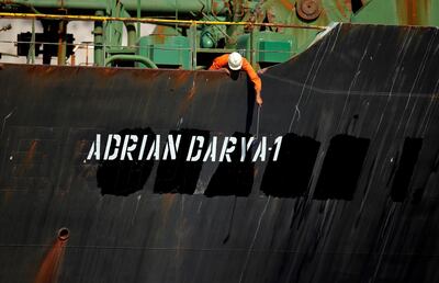 A crew member takes pictures with a mobile phone on Iranian oil tanker Adrian 'Darya 1', now renamed the 'Adrian Darya-1'. Reuters