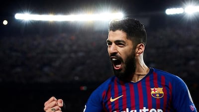 Barcelona's forward Luis Suarez celebrates his opening goal. EPA