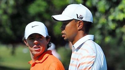 Rory McIlroy, left, looked set to leave Tiger Woods in his dust until a slow start to his 2013 season, and Woods's back-to-back victories, has seen the American usurp the Northern Irishman for the world's No 1 ranking.