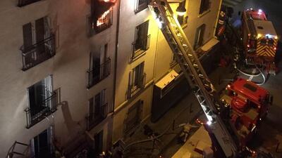 Firefighter battle flames during the fire. Norman Grandjean/ AFP Photo
