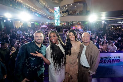 Forgotten Island directors Joel Crawford, left, and Januel Mercado, right, with voice leads H.E.R. (second from left) and Liza Soberano. Getty Images