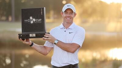 Rory McIlroy of Northern Ireland celebrates with the trophy after winning the CJ Cup at Congaree Golf Club. Getty