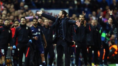 Head coach Diego Simeone of Atletico Madrid reacts to the fans during the Uefa Champions League quarter-final second leg match between Atletico Madrid and FC Barcelona at Vincente Calderon on April 13, 2016 in Madrid, Spain. (Photo by Alex Grimm/Bongarts/Getty Images)