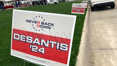Ron DeSantis's 'Never Back Down' yard signs. AP
