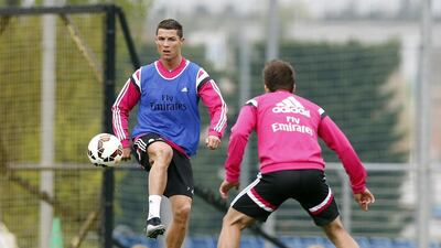 Diego Forlan remembers training at Manchester United alongside Cristiano Ronaldo, another footballer who has famously put in extra hours of training. Victor Carretero/ Getty