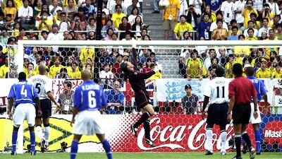 David Seaman can only look on as the ball sails over his head and into the net after a long-range shot from Brazil's Ronaldinho. This goal knocked England out at the quarter final stage of the 2002 World Cup.