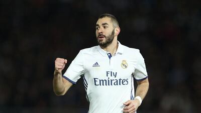 Real Madrid’s Karim Benzema celebrates scoring the first goal. Behrouz Mehri / AFP