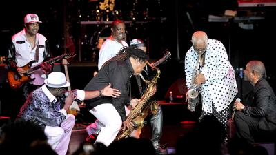 Kool & the Gang perform with Amir Bayyan, top left, and Lavell Evans, bottom left, in Las Vegas. BET / Getty Images