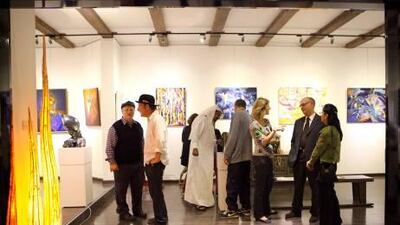 The art squad is made up of a disparate group of expat artists and is led by Bruce Hill. The gallery owner is Khalil Saddiq. Their exhibition of contemporary modern art entitled "Etihad Colours" opens at Etihad Antiques Gallery. Fatima AL Marzooqi/The National.