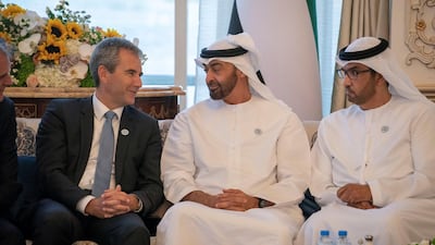 Sheikh Mohammed bin Zayed, Crown Prince of Abu Dhabi and Deputy Supreme Commander of the UAE Armed Forces, receives Hartwig Loger, Austria's Minister of Finance Austria, during a Sea Palace barza. Seen with Dr Sultan Ahmed Al Jaber, UAE Minister of State, Chairman of Masdar and CEO of Adnoc Group. Courtesy Crown Prince Court - Abu Dhabi ---