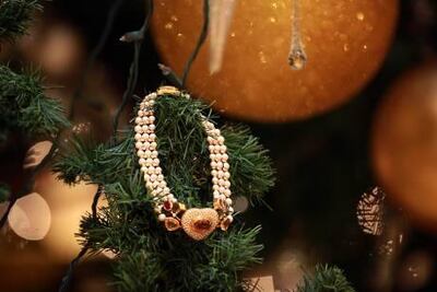 Along with a Dh3.5 million diamond necklace, the tree featured an assortment of emeralds, pearls and sapphires. Delores Johnson / The National