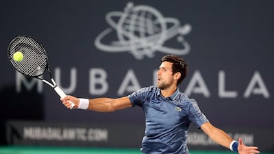 Novak Djokovic returns a shot against Karen Khachanov during their Mubadala World Tennis Championship match at Zayed Sports City. Reuters
