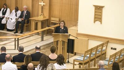 Barbara Leaf, Ambassador of the United States, reads from the Old Testament at St Andrew's Church Remembrance Day service. Reem Mohammed / The National