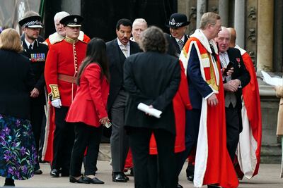 Lionel Richie, centre, wore a formal morning suit to the crowning of King Charles III. Reuters