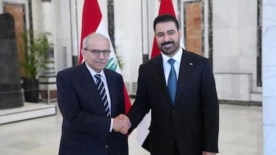 Iraq's Prime Minister Ali Al Zaidi greets Lebanese Prime Minister Nawaf Salam, left, in Baghdad on Sunday. Iraq PMO / AFP