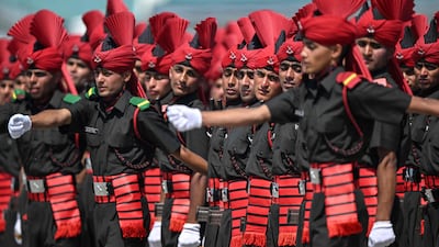 Newly recruited Indian army soldiers from the Jammu and Kashmir Light Infantry (JAKLI) take part in a passing-out parade at the JAKLI army headquarters in Srinagar on June 5, 2025. (Photo by Tauseef MUSTAFA / AFP)