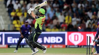 Qalanders batsman Dawid Malan is bowled by Kevin Koththigoda of the Bangla Tigers. Chris Whiteoak / The National