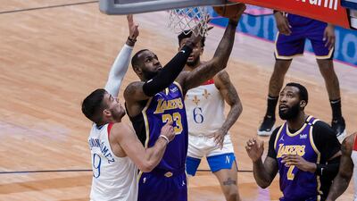 Los Angeles Lakers forward LeBron James shoots over New Orleans Pelicans centre Willy Hernangomez. AP