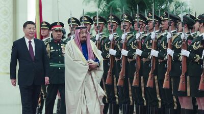 Chinese President Xi Jinping and Saudi Arabia’s King Salman bin Abdulaziz inspect a honour guard at the Great Hall of the People in Beijing, China. Lintao Zhang / Getty Images