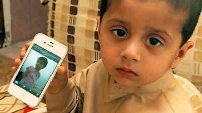 Nawaf Yousef Ali Johar with an image of his sister Khadija.